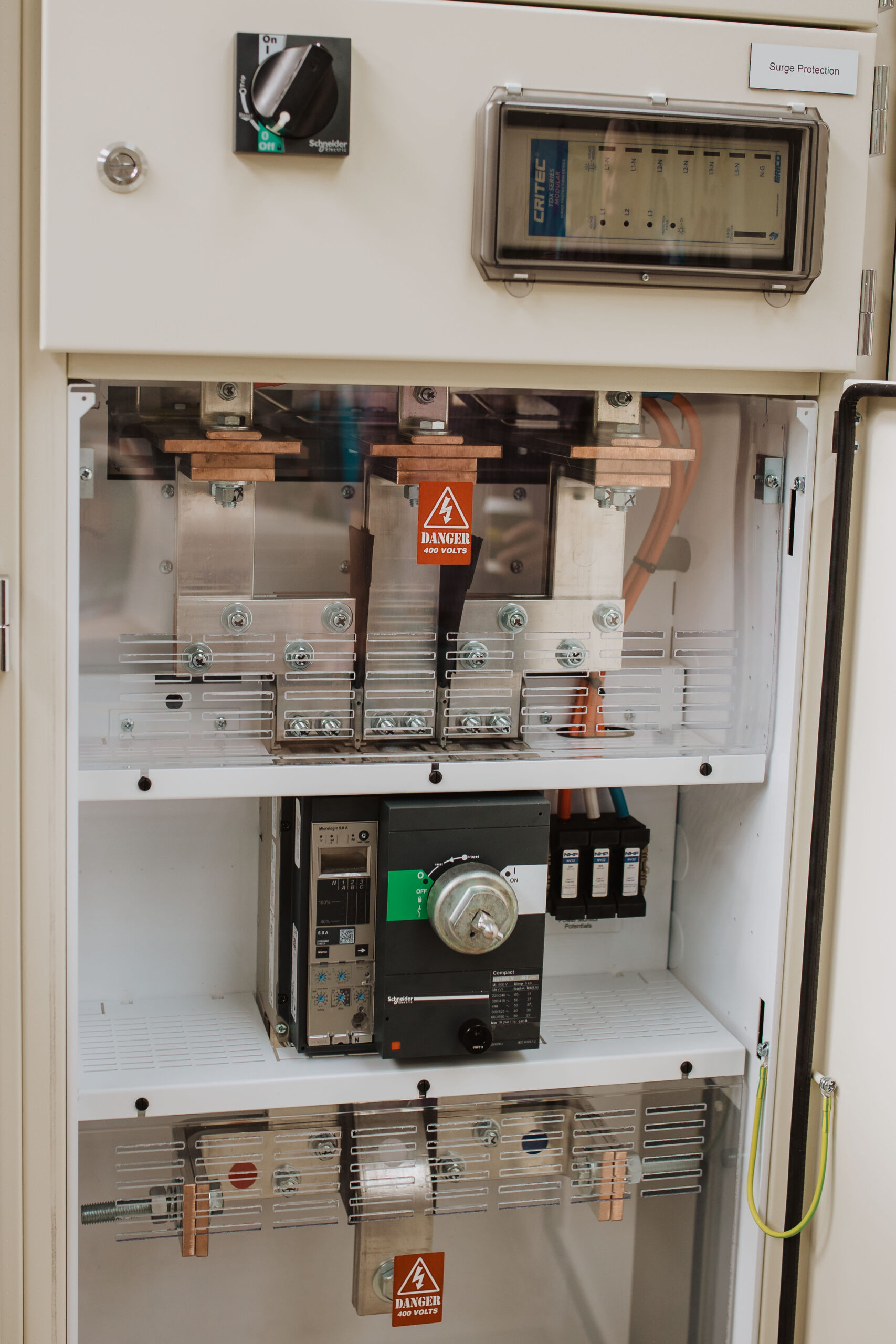 Switchboard panel with Schneider Electric main switch and Critec surge protection device installed by Clive Wilson Switchboards Invercargill