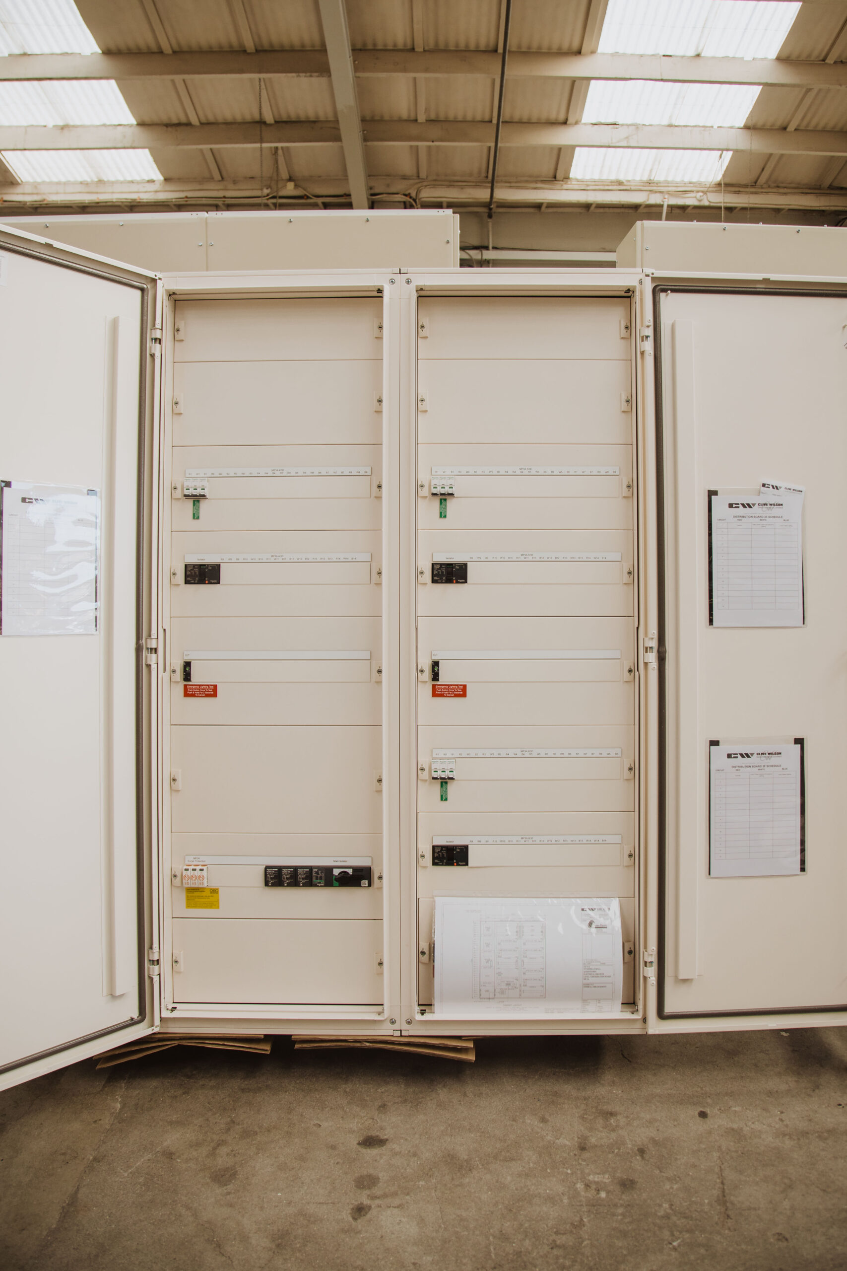 Top view of large electrical switchboard cabinets on the workshop floor at Clive Wilson Switchboards Invercargill