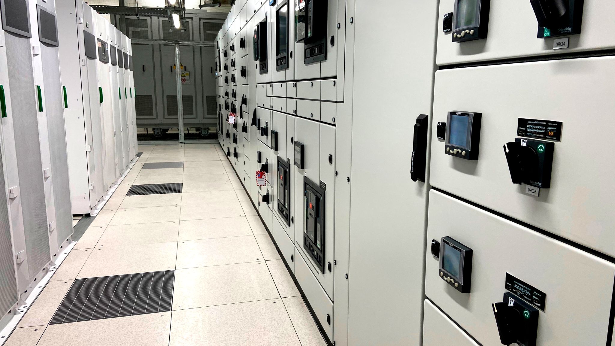 Logstrup switchboards installed at a New Zealand industrial site — Schneider Electric breakers and metering fitted on the door fascia