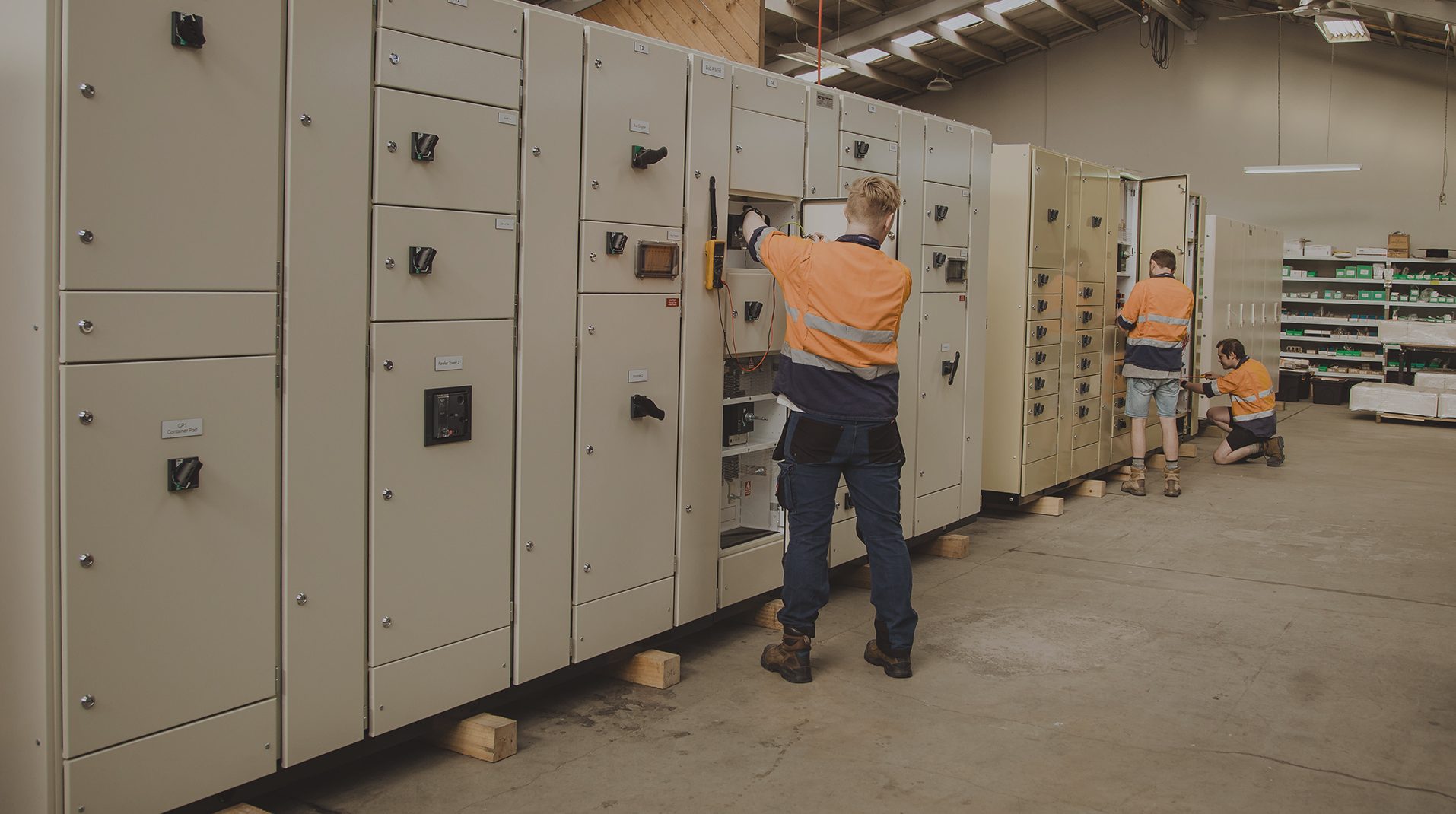 CWS electricians working along a completed switchboard