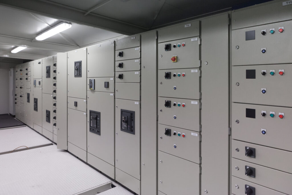 Motor control centre cubicle fronts inside a completed switchroom at Clive Wilson Switchboards, Invercargill NZ